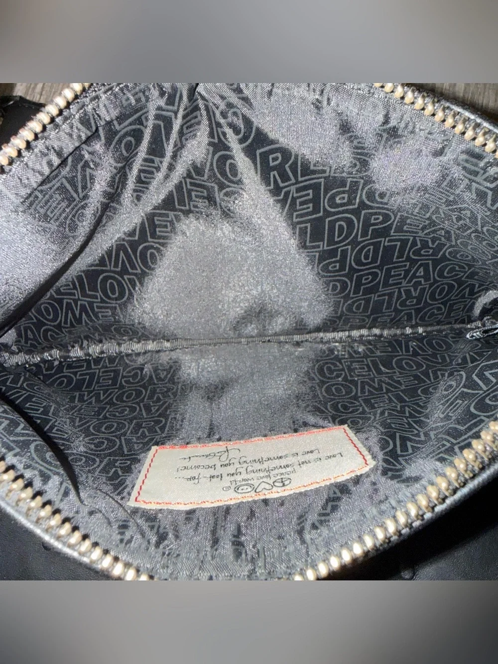 2 Peace Love World Black Embossed Leather Clutch Wristlets